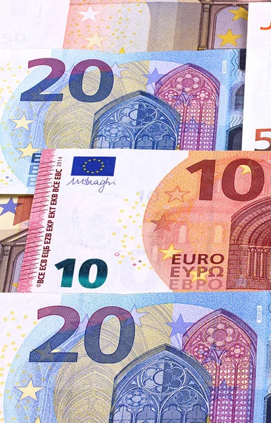 Euro geld bankbiljetten verschillende denominaties abstract achtergrond. — Stockfoto