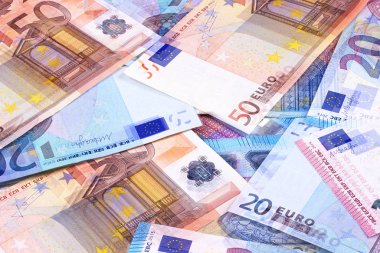 Euro Money Banknotes of Different denominations abstract background. clipart
