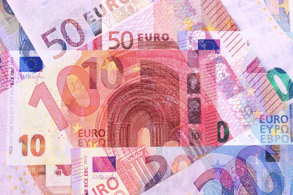 Euro geld bankbiljetten van verschillende denominaties abstract achtergrond. — Stockfoto