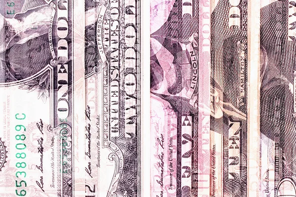 Abstract dollar bills of different denominations background. — Stock Photo, Image