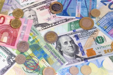 Dolar euro İsviçre Frangı ve madeni paraların arka plan.