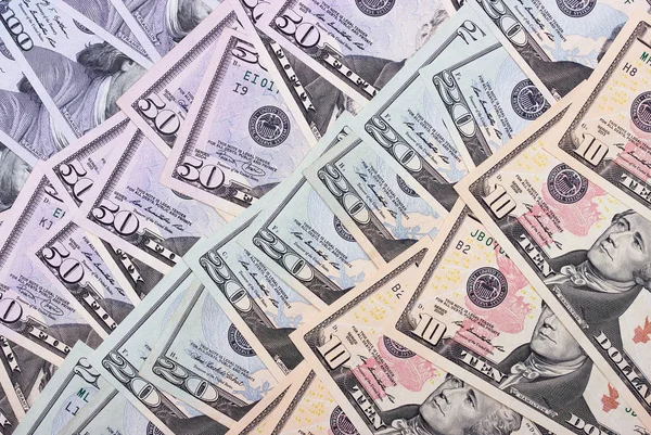Абстрактные деньги фон нас доллары разных деноминаций . — стоковое фото