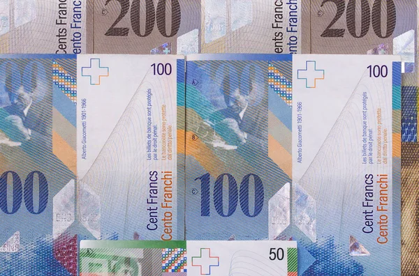 Ελβετικό Φράγκο διαφορετικά αφηρημένη χρήματα φόντου. — Φωτογραφία Αρχείου