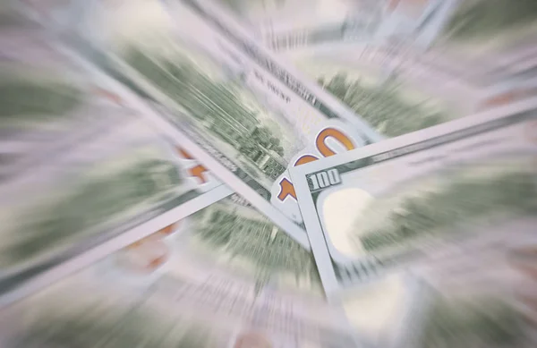 Amerikanska dollar i olika valörer blured bakgrund. — Stockfoto