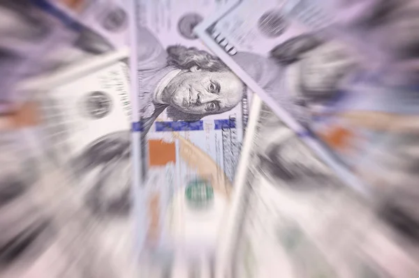 Amerikanska dollar i olika valörer blured bakgrund. — Stockfoto
