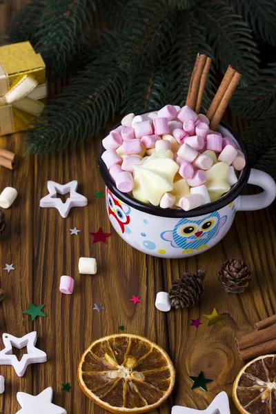 Christmas background star, cup marshmellow cinnamon brown wooden table. — Stock Photo, Image