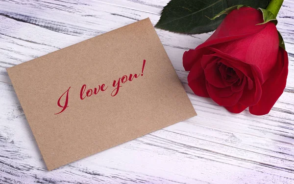 Valentines day greeting card with red rose and lettering I love you. — Stock Photo, Image