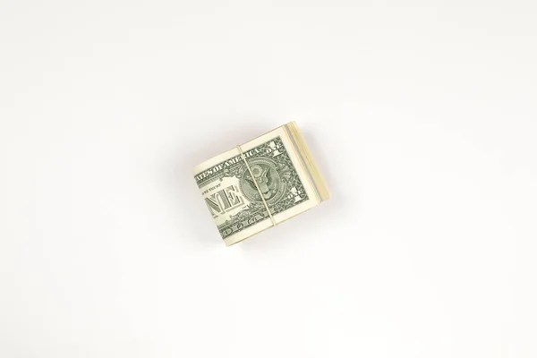 Pilha de EUA 1 dólar isolado em fundo branco . — Fotografia de Stock