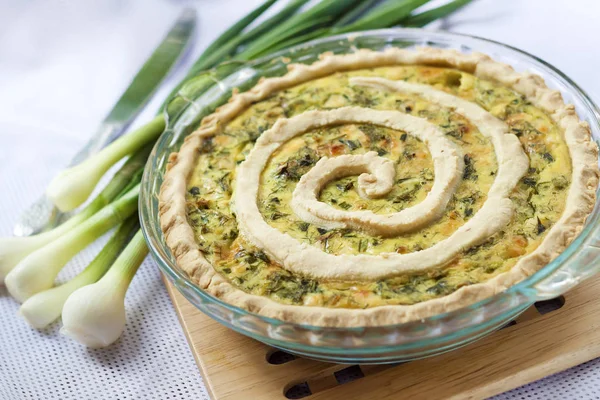 Tart with goat cheese and green onions — Stock Photo, Image