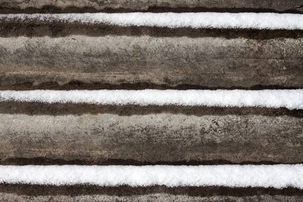 Ardósia fundo com neve deitada sobre ele — Fotografia de Stock