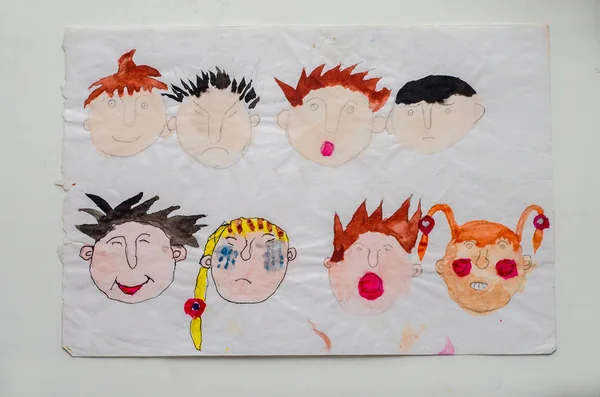 child drawing emotions of different people