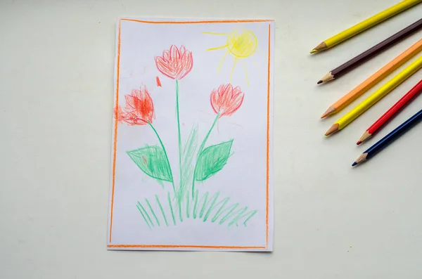 child\'s drawing of tulips for holiday