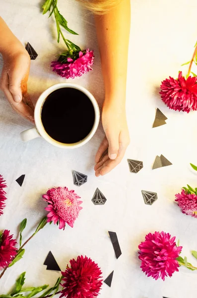 view from above. fresh flowers. diamonds. romantic mood. hot coffee