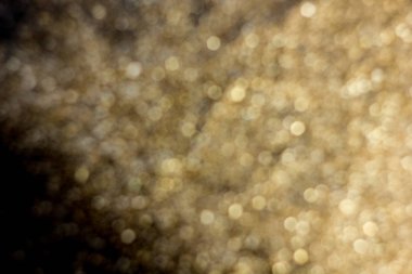 Altın tozu dekorasyon mevsimlik siyah arka plan üzerine