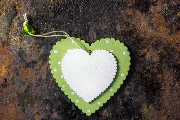 Green wooden heart and white wooden heart — Stock Photo, Image