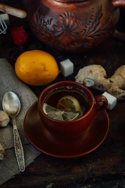 Nice and hot ginger tea with lime and lemon. — Stock Photo, Image