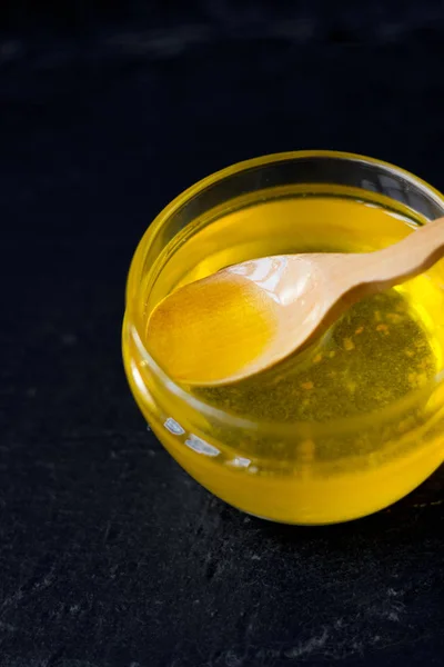 Indian ghee in a transparent glass bowl. — Stock Photo, Image