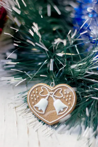 Christmas background with heart on christmas tree. — Stock Photo, Image