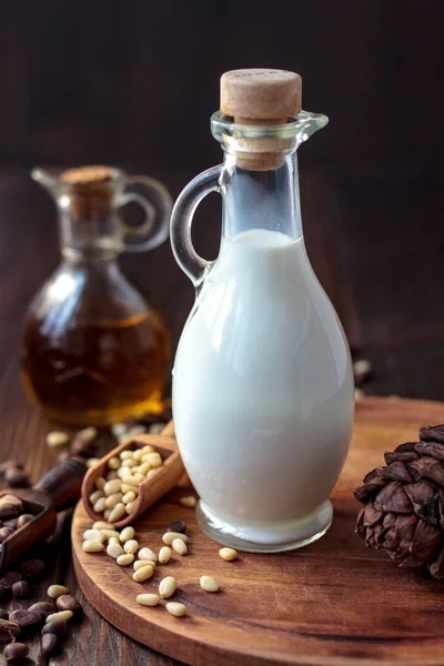 Fresh pine or cedar milk - vegan milk made from cone nuts. — Stock Photo, Image