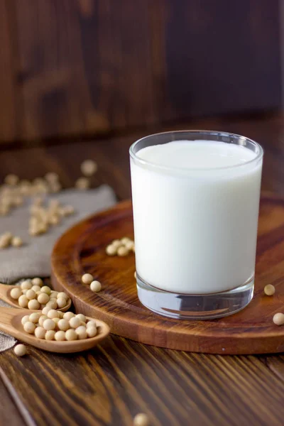 Soybean milk with soy beans around it