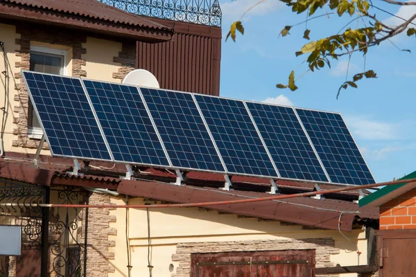 Solar energy panels on the roof of the house. aternative energy. Solar battery