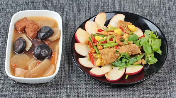 Chinese Vegetable festival  food as fried ginkgo with mixed vegetables served with streamed Chinese medicine herb soup ,  \