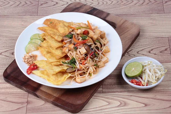 Chinese Vegetable festival  food as crispy wonton with Thai fried mixed vegetable call  