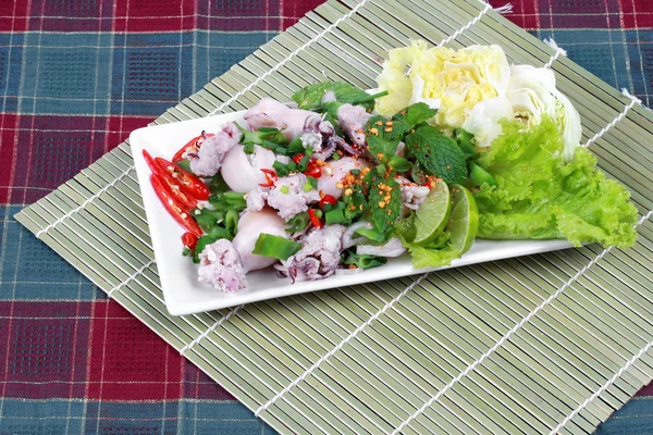 Spicy and sour mixed herb salad with squid wrap minced pork . Side view. — Stock Photo, Image