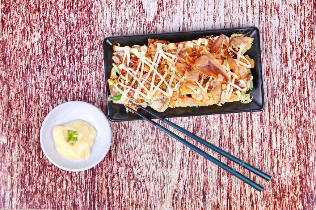 Japan pizza as "Okonomiyaki" is fried mixed vegetable flour with meat