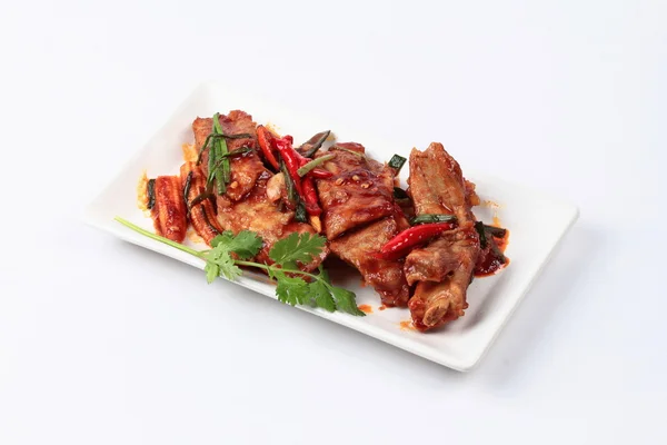 Fried pork spare ribs with grilled chili curry. — Stock Photo, Image