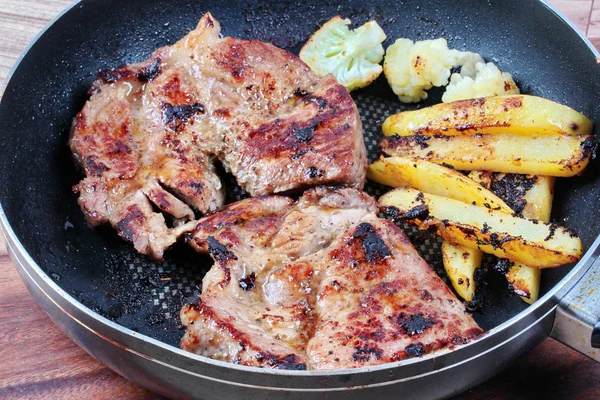 Home made ,Cooking pork steak with herb in pan . — Stock Photo, Image