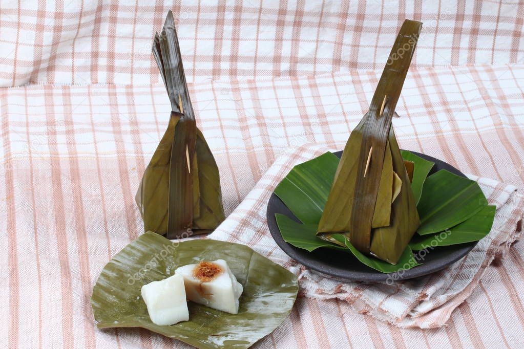 Steamed flour wrap sweet mashed coconut as Khanom Sai Sii