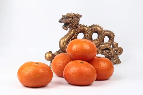 Golden orange with golden dragon and silver celebrate the blessi