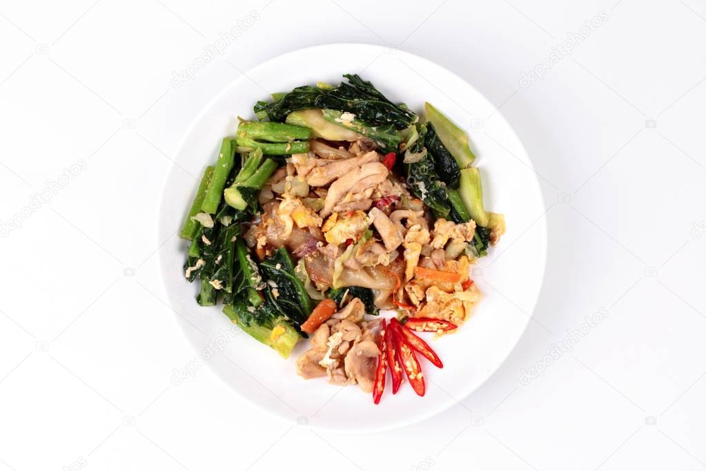 Fried big noodle with chicken and vegetables.