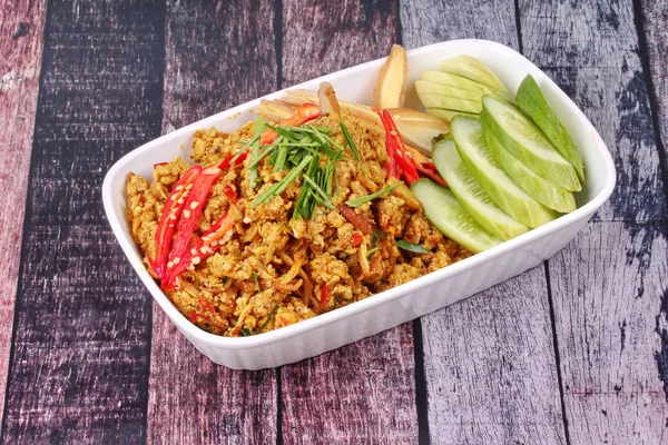 Spicy roasted mince chicken with yellow curry paste ,call Khua K