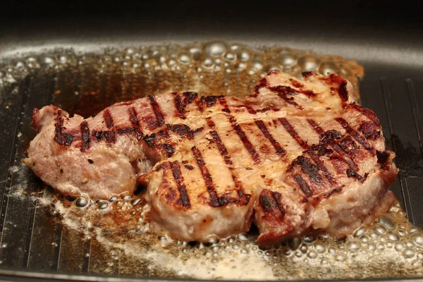 Homemade cooking , Pork steak in pan for served. — Stock Photo, Image