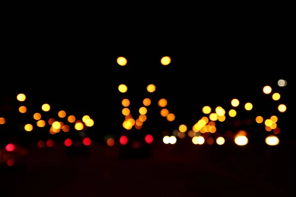 Night city street lights bokeh background. — Stock Photo, Image