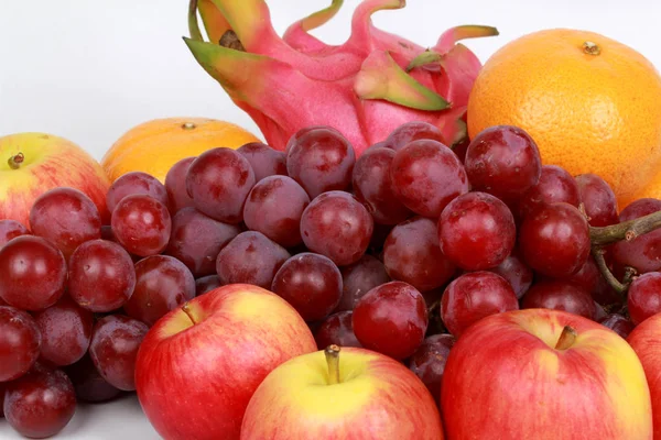 Mixed fruits as Red seedless grapes,orange,apple,Dragon fruit,Ja — Stock Photo, Image