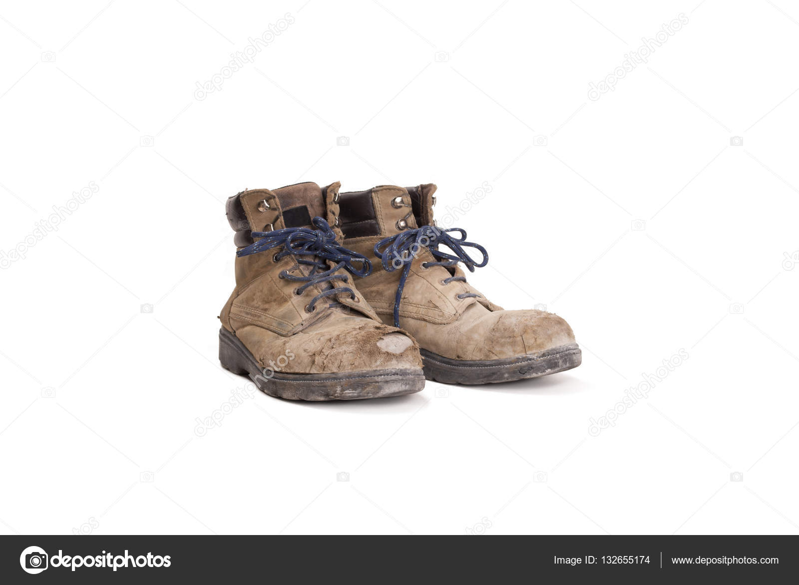Pair of old battered worker boots on white background Stock Photo by  ©MonicaClick1 132655174