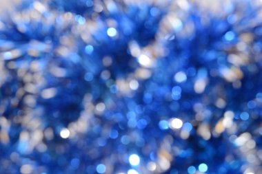Festival mavi Noel tinsel arka plan. Daireler bokeh