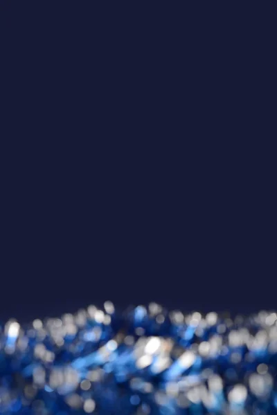 Festival mavi ve gümüş Noel tinsel arka plan. 