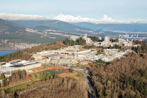 Aerial view of Simon Fraser University (SFU) on Burnaby Mountain. Picture taken in Vancouver Lower Mainland, British Columbia, Canada.