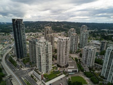 Aerial view on residential apartment buildings in Coquitlam, Greater Vancouver, British Columbia, Canada. clipart