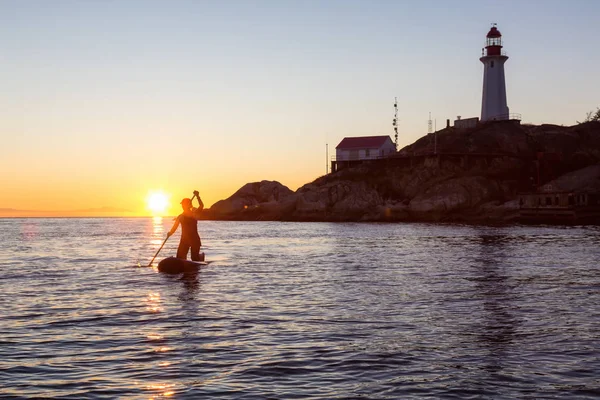 Paddle Boarding by Lighthouse — Stock Photo, Image