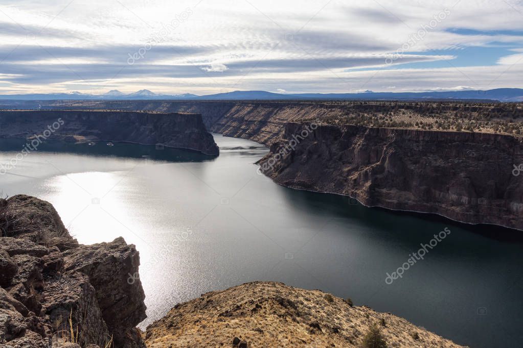 Beautiful Amarican landscape during a vibrant sunny day. Taken at The Cove Palisades State Park in Oregon, North America.