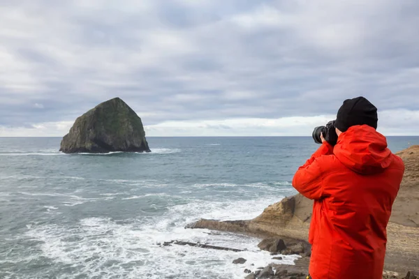 Adventurous Man Camera Standing Taking Pictures Beautiful Ocean Vibrant Winter — Stock Photo, Image