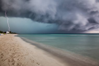 Varadero, Cuba. Thunder and Lightening Storm passing over the sandy beach near the Caribbean Sea.