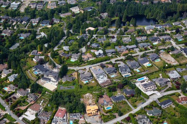 Aerial View of luxury homes in British Properties, West Vancouver, British Columbia, Canada. Taken during a sunny summer day.