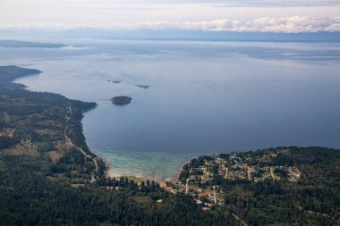 Aerial View of Gillies Bay on Texada Island, British Columbia, Canada. Taken during a hazy summer morning. clipart