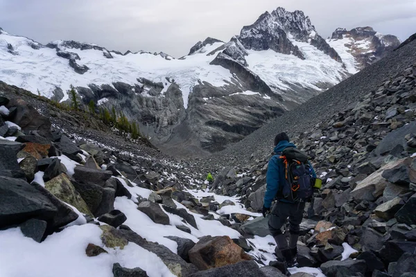 Adventurous Female Hiker on top of a mountain — 스톡 사진